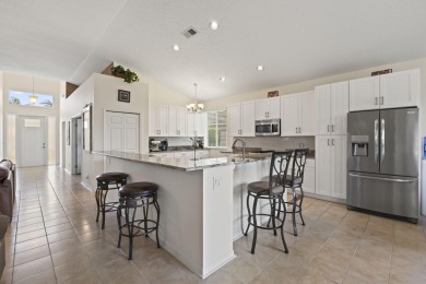 Welcome to this rare lakefront home on a cul-de-sac in the heart on St. Lucie Trail Golf Club in Florida - for sale on GolfHomes.com, golf home, golf lot