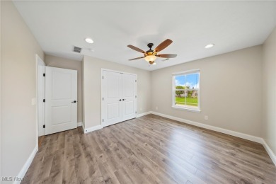 Welcome to this beautifully maintained 4-bedroom home with a on Shale Creek Golf Club in Ohio - for sale on GolfHomes.com, golf home, golf lot