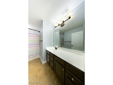 Welcome to this beautifully maintained 4-bedroom home with a on Shale Creek Golf Club in Ohio - for sale on GolfHomes.com, golf home, golf lot
