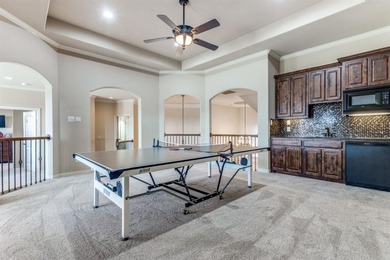 Set on a premier golf course lot with breathtaking sunset views on The Trails of Frisco Golf Club in Texas - for sale on GolfHomes.com, golf home, golf lot