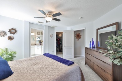 Wake up every day feeling like you're on vacation in this on Tampa Bay Golf and Country Club in Florida - for sale on GolfHomes.com, golf home, golf lot