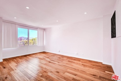 Elegant High-Rise Living at The Comstock, Set high on the 7th on Los Angeles Country Club in California - for sale on GolfHomes.com, golf home, golf lot