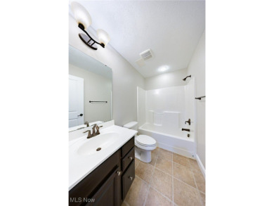 Welcome to this beautifully maintained 4-bedroom home with a on Shale Creek Golf Club in Ohio - for sale on GolfHomes.com, golf home, golf lot