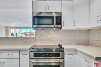 Elegant High-Rise Living at The Comstock, Set high on the 7th on Los Angeles Country Club in California - for sale on GolfHomes.com, golf home, golf lot