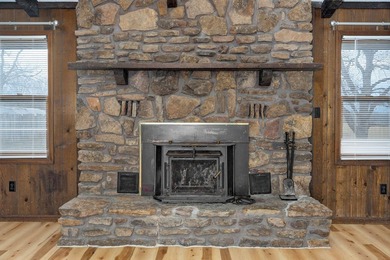 3839 N Stewart offers a spacious 3 bed, 2.5 bath split-level on Bill and Payne Stewart Golf Course  in Missouri - for sale on GolfHomes.com, golf home, golf lot