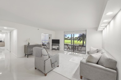 This completely remodeled first-floor residence in the Promenade on Boca Pointe Country Club in Florida - for sale on GolfHomes.com, golf home, golf lot