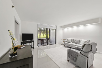 This completely remodeled first-floor residence in the Promenade on Boca Pointe Country Club in Florida - for sale on GolfHomes.com, golf home, golf lot
