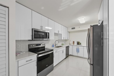 This completely remodeled first-floor residence in the Promenade on Boca Pointe Country Club in Florida - for sale on GolfHomes.com, golf home, golf lot