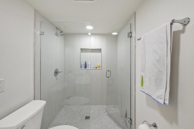 This completely remodeled first-floor residence in the Promenade on Boca Pointe Country Club in Florida - for sale on GolfHomes.com, golf home, golf lot