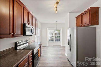 Welcome home to this charming townhome in the heart of on Mooresville Golf Course in North Carolina - for sale on GolfHomes.com, golf home, golf lot