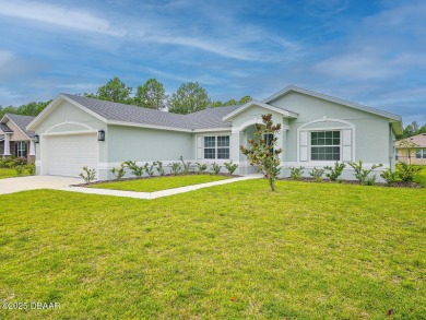 Recently purchased but never lived in! This beautiful 3-bedroom on The Grand Club - Pine Lakes Course in Florida - for sale on GolfHomes.com, golf home, golf lot