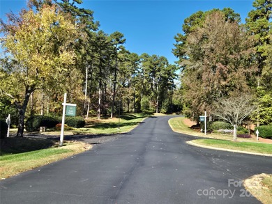This golf course lot is located on the 10th fairway of the Old on Old North State Club at Uwharrie Point Golf community in North Carolina - for sale on GolfHomes.com, golf home, golf lot