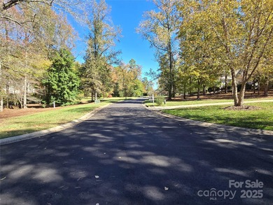 This golf course lot is located on the 10th fairway of the Old on Old North State Club at Uwharrie Point Golf community in North Carolina - for sale on GolfHomes.com, golf home, golf lot