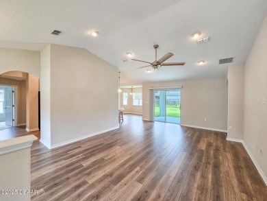 Recently purchased but never lived in! This beautiful 3-bedroom on The Grand Club - Pine Lakes Course in Florida - for sale on GolfHomes.com, golf home, golf lot