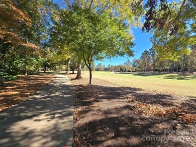 This golf course lot is located on the 10th fairway of the Old on Old North State Club at Uwharrie Point Golf community in North Carolina - for sale on GolfHomes.com, golf home, golf lot