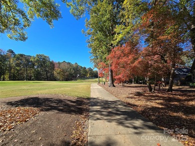 This golf course lot is located on the 10th fairway of the Old on Old North State Club at Uwharrie Point Golf community in North Carolina - for sale on GolfHomes.com, golf home, golf lot