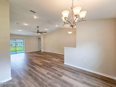 Recently purchased but never lived in! This beautiful 3-bedroom on The Grand Club - Pine Lakes Course in Florida - for sale on GolfHomes.com, golf home, golf lot