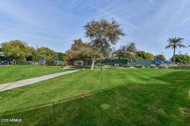 This luxurious, move-in-ready home features a stunning chef's on Sun City Grand Golf Couse and Club in Arizona - for sale on GolfHomes.com, golf home, golf lot