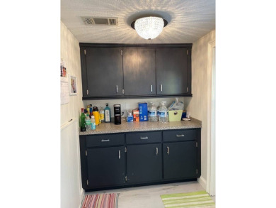 TIRED OF SNOW,ICE AND COLD, TRADE IT IN FOR SUN,WARM AND WHITE on Lake Fairways Country Club in Florida - for sale on GolfHomes.com, golf home, golf lot