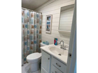 TIRED OF SNOW,ICE AND COLD, TRADE IT IN FOR SUN,WARM AND WHITE on Lake Fairways Country Club in Florida - for sale on GolfHomes.com, golf home, golf lot