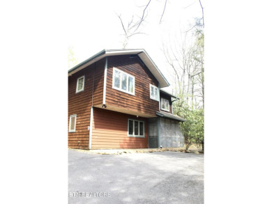 Adorable Chalet located minutes from downtown Gatlinburg. Priced on Bent Creek Golf Course in Tennessee - for sale on GolfHomes.com, golf home, golf lot