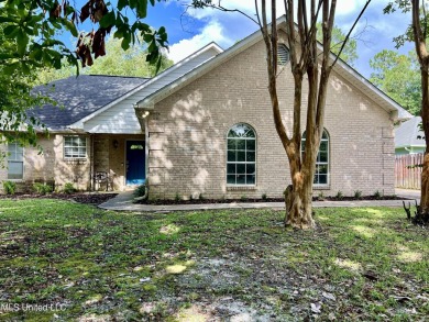 Welcome to your next chapter near Hickory Hill Golf Country Club on Mississippi National Golf Course in Mississippi - for sale on GolfHomes.com, golf home, golf lot