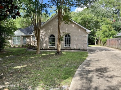 Welcome to your next chapter near Hickory Hill Golf Country Club on Mississippi National Golf Course in Mississippi - for sale on GolfHomes.com, golf home, golf lot