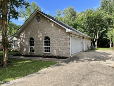 Welcome to your next chapter near Hickory Hill Golf Country Club on Mississippi National Golf Course in Mississippi - for sale on GolfHomes.com, golf home, golf lot