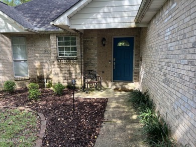 Welcome to your next chapter near Hickory Hill Golf Country Club on Mississippi National Golf Course in Mississippi - for sale on GolfHomes.com, golf home, golf lot