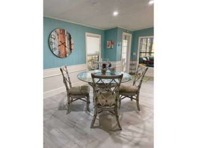 TIRED OF SNOW,ICE AND COLD, TRADE IT IN FOR SUN,WARM AND WHITE on Lake Fairways Country Club in Florida - for sale on GolfHomes.com, golf home, golf lot
