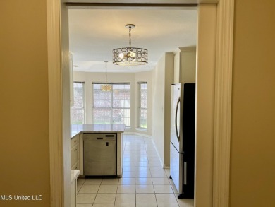 Welcome to your next chapter near Hickory Hill Golf Country Club on Mississippi National Golf Course in Mississippi - for sale on GolfHomes.com, golf home, golf lot