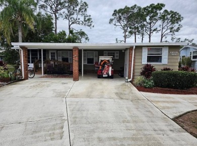 TIRED OF SNOW,ICE AND COLD, TRADE IT IN FOR SUN,WARM AND WHITE on Lake Fairways Country Club in Florida - for sale on GolfHomes.com, golf home, golf lot