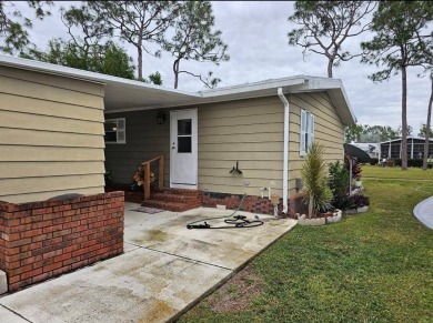 TIRED OF SNOW,ICE AND COLD, TRADE IT IN FOR SUN,WARM AND WHITE on Lake Fairways Country Club in Florida - for sale on GolfHomes.com, golf home, golf lot