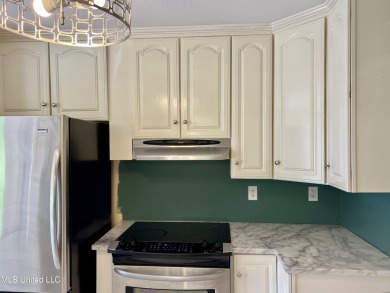 Welcome to your next chapter near Hickory Hill Golf Country Club on Mississippi National Golf Course in Mississippi - for sale on GolfHomes.com, golf home, golf lot