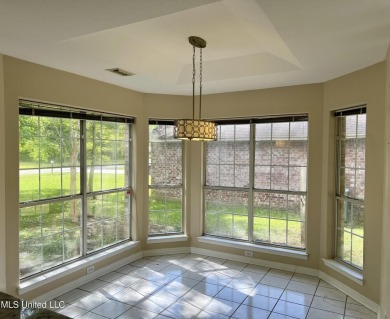 Welcome to your next chapter near Hickory Hill Golf Country Club on Mississippi National Golf Course in Mississippi - for sale on GolfHomes.com, golf home, golf lot