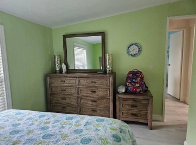 TIRED OF SNOW,ICE AND COLD, TRADE IT IN FOR SUN,WARM AND WHITE on Lake Fairways Country Club in Florida - for sale on GolfHomes.com, golf home, golf lot