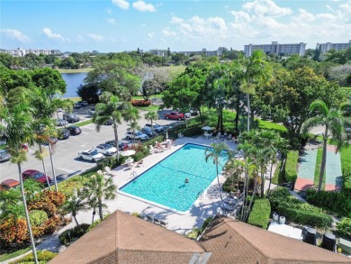 Wow! Beautiful Corner Unit W/ Breathtaking Lake Views From on Palm-Aire Country Club and Resort - Palms in Florida - for sale on GolfHomes.com, golf home, golf lot