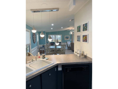 TIRED OF SNOW,ICE AND COLD, TRADE IT IN FOR SUN,WARM AND WHITE on Lake Fairways Country Club in Florida - for sale on GolfHomes.com, golf home, golf lot