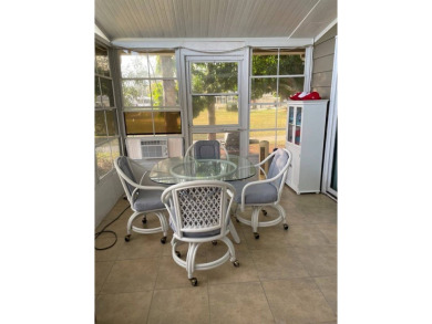 TIRED OF SNOW,ICE AND COLD, TRADE IT IN FOR SUN,WARM AND WHITE on Lake Fairways Country Club in Florida - for sale on GolfHomes.com, golf home, golf lot