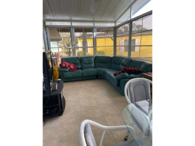TIRED OF SNOW,ICE AND COLD, TRADE IT IN FOR SUN,WARM AND WHITE on Lake Fairways Country Club in Florida - for sale on GolfHomes.com, golf home, golf lot