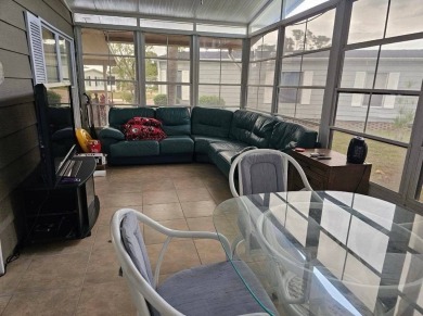 TIRED OF SNOW,ICE AND COLD, TRADE IT IN FOR SUN,WARM AND WHITE on Lake Fairways Country Club in Florida - for sale on GolfHomes.com, golf home, golf lot