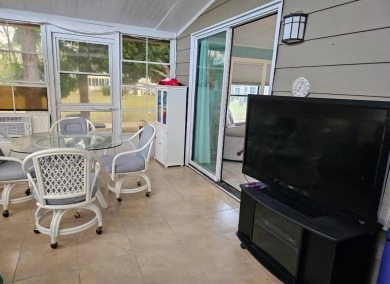 TIRED OF SNOW,ICE AND COLD, TRADE IT IN FOR SUN,WARM AND WHITE on Lake Fairways Country Club in Florida - for sale on GolfHomes.com, golf home, golf lot