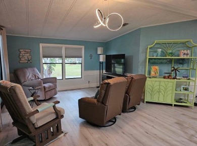 TIRED OF SNOW,ICE AND COLD, TRADE IT IN FOR SUN,WARM AND WHITE on Lake Fairways Country Club in Florida - for sale on GolfHomes.com, golf home, golf lot