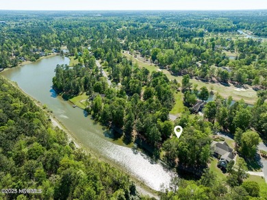 Beautiful residential pond setting in Sycamore Forest at premier on River Landing Golf Course in North Carolina - for sale on GolfHomes.com, golf home, golf lot