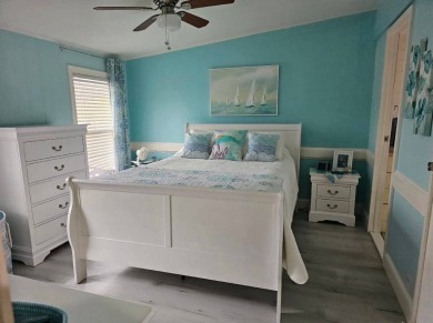 TIRED OF SNOW,ICE AND COLD, TRADE IT IN FOR SUN,WARM AND WHITE on Lake Fairways Country Club in Florida - for sale on GolfHomes.com, golf home, golf lot