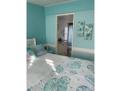 TIRED OF SNOW,ICE AND COLD, TRADE IT IN FOR SUN,WARM AND WHITE on Lake Fairways Country Club in Florida - for sale on GolfHomes.com, golf home, golf lot