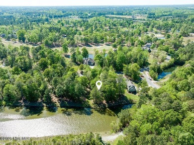 Beautiful residential pond setting in Sycamore Forest at premier on River Landing Golf Course in North Carolina - for sale on GolfHomes.com, golf home, golf lot