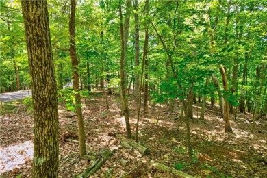 Discover this beautiful lot on .82 acres in the highly on Big Canoe Golf Club - Cherokee in Georgia - for sale on GolfHomes.com, golf home, golf lot