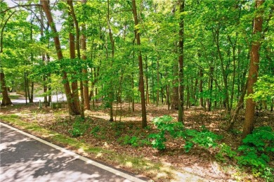 Discover this beautiful lot on .82 acres in the highly on Big Canoe Golf Club - Cherokee in Georgia - for sale on GolfHomes.com, golf home, golf lot