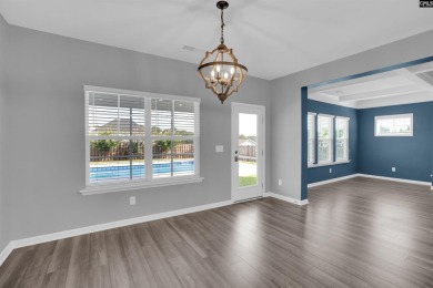 Stunning 5 Bedroom, 4.5 Bath Home with Heated Pool  Outdoor on The Members Club At Woodcreek in South Carolina - for sale on GolfHomes.com, golf home, golf lot